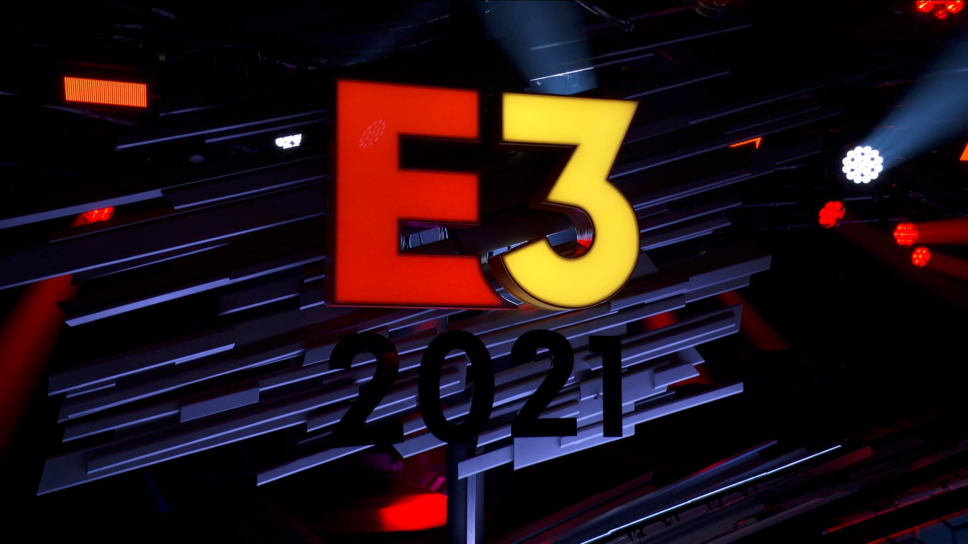 Imagem de divulgação da E3, maior feira de games do mundo com uma arte escura e a letra E em vermelho e o número 3 em amarelo