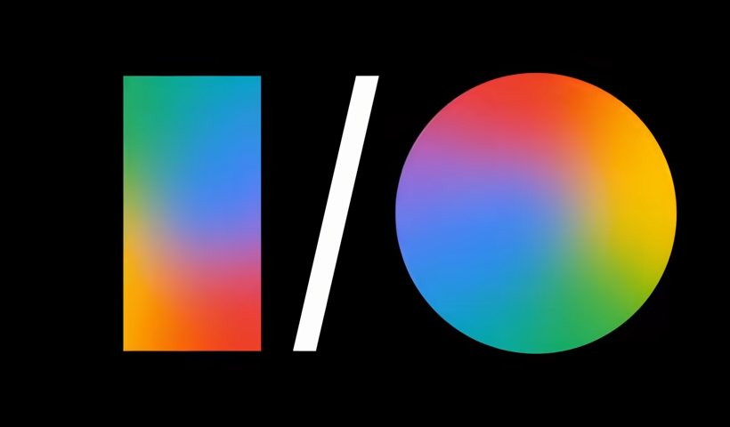 Logotipo do Google I/O exibido sobre fundo preto, com formas geométricas coloridas em degradê representando o evento anual da Google voltado para desenvolvedores e anúncios de novas tecnologias e recursos da empresa. Créditos: Google divulgação.